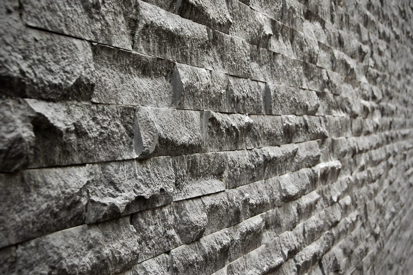 coarse rugged slanted lonely wall